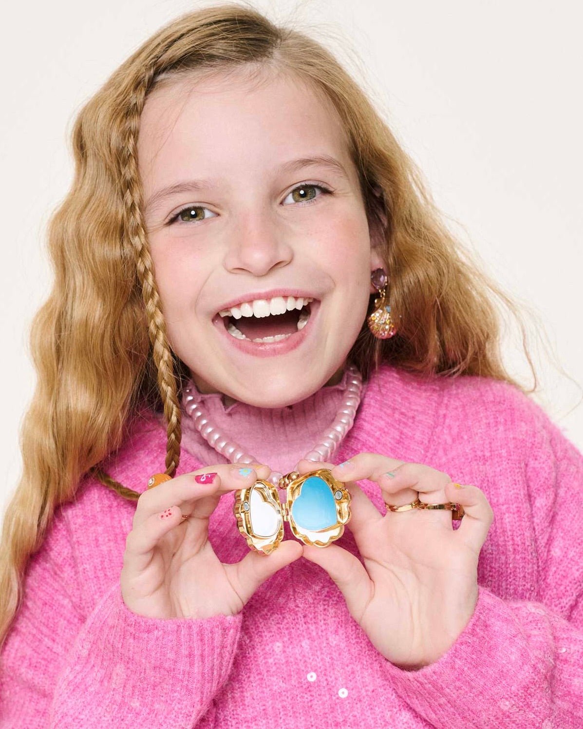 Super Smalls Sparkle Shell lip gloss locket necklace with mirror
